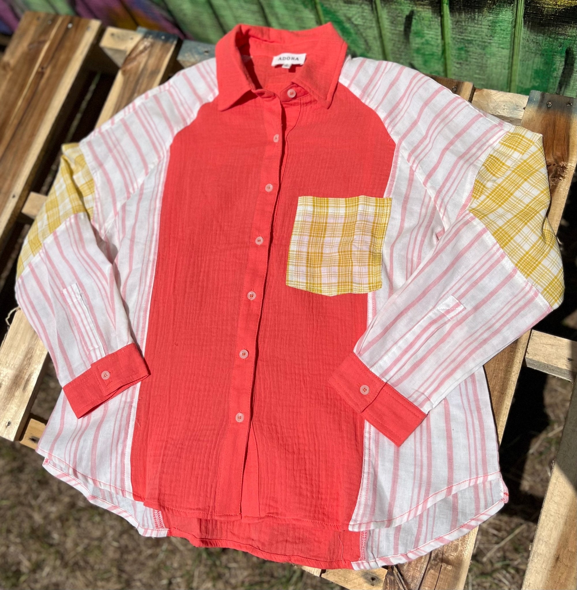 Color block blouse w/ solid, stripes, & plaid multicolored prints in deep coral, mustard & white textured design.