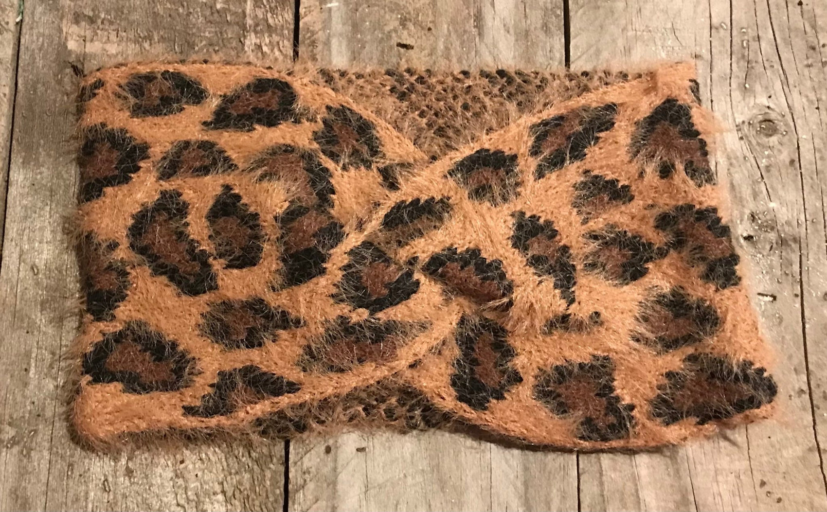 Pretty Simple brand. This camel and leopard twist head band is made from fuzzy knit. $10