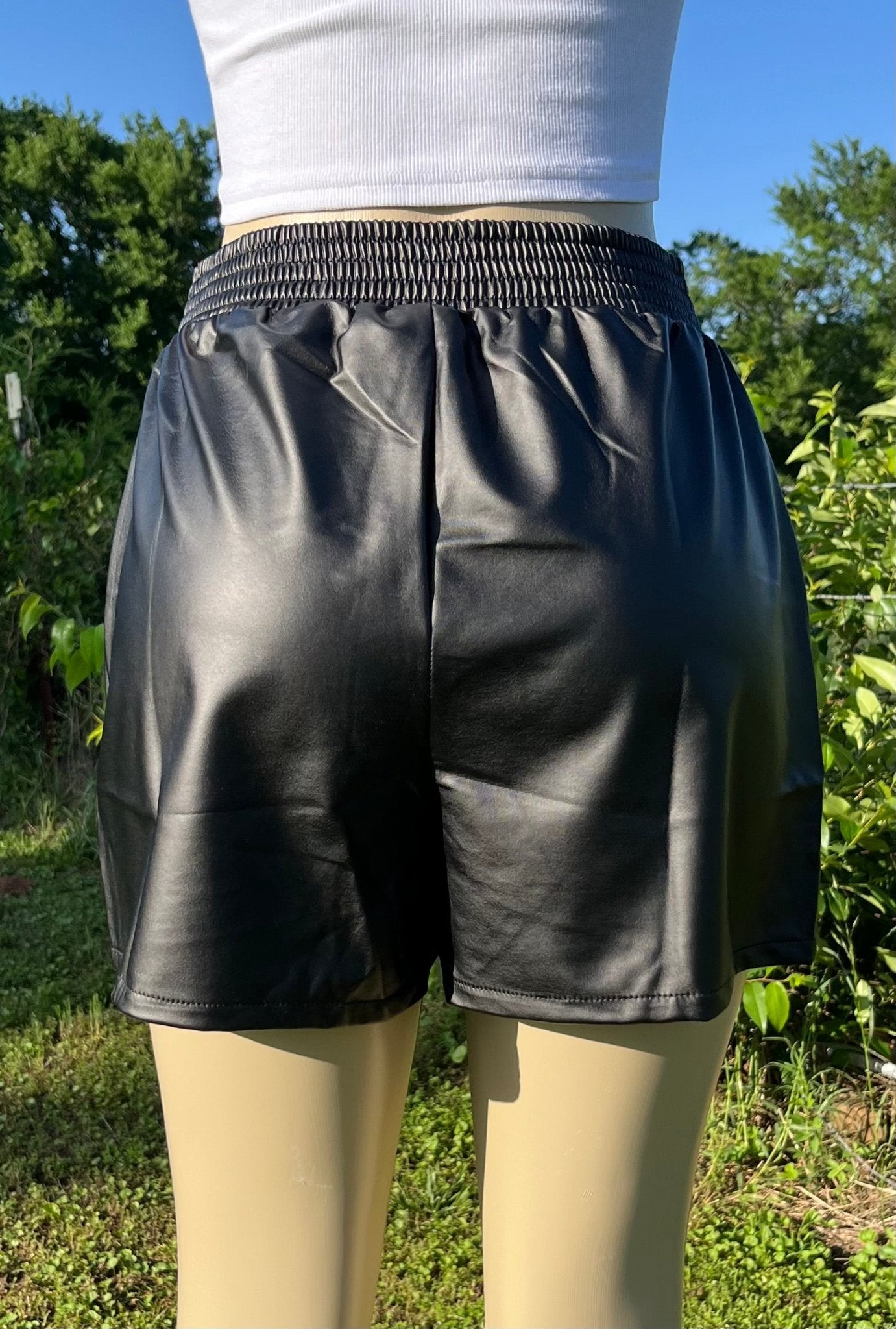 Cotton Bleu brand. Black faux leather loose fit shorts with elastic waist. Machine wash. S, M, L, XL. $25