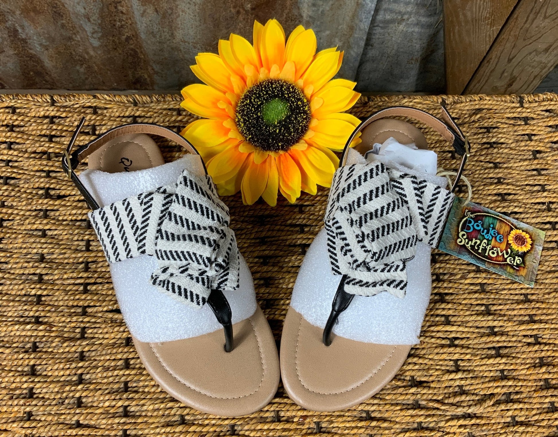 Stella Shoes brand. Black and white flats, tribal bow design, sling back sandal.