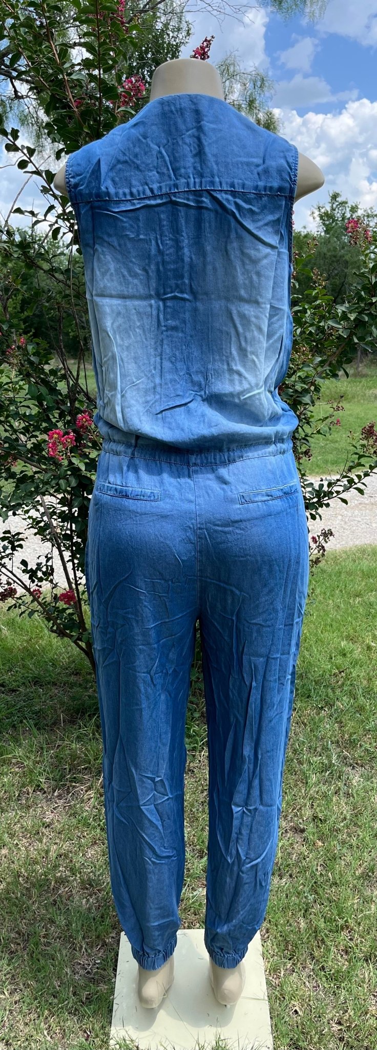 42POPS brand. Sleeveless Chambray jumpsuit with pockets, a drawstring waist and ankle cuffs. S, M, L, XL $28