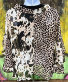 AMOLI brand. Sheer chiffon fabric with leopard and splotched color block design with sliced ruffled sleeves. S, M, L. $38