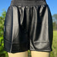 Cotton Bleu brand. Black faux leather loose fit shorts with elastic waist. Machine wash. S, M, L, XL. $25