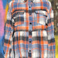 Umorger brand. Plaid flannel button down flared bottom top in blue, orange, white and black with cut hem. S, M, L, XL. $50 