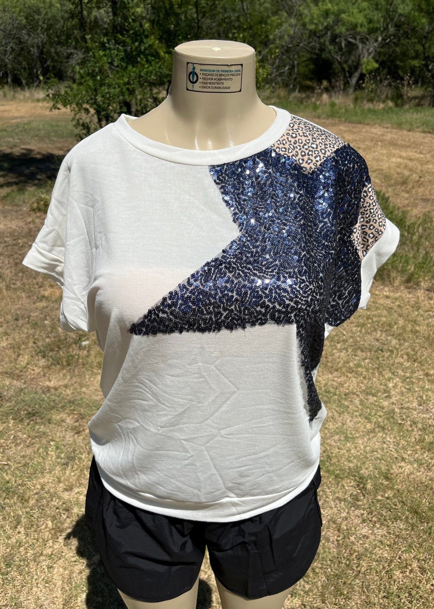 Vanilla Monkey brand. Beige knit top w/ large black sequined star & leopard print shoulder accent with short banded sleeves.