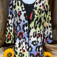 Stylish Wholesale brand. This cardie has multicolored ombre with leopard print an open front and 3/4 sleeves. S, M, L $10