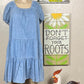 Shopin LA brand. This lightweight denim dress has elastic neckline and sleeves, tiered skirt and side pockets.