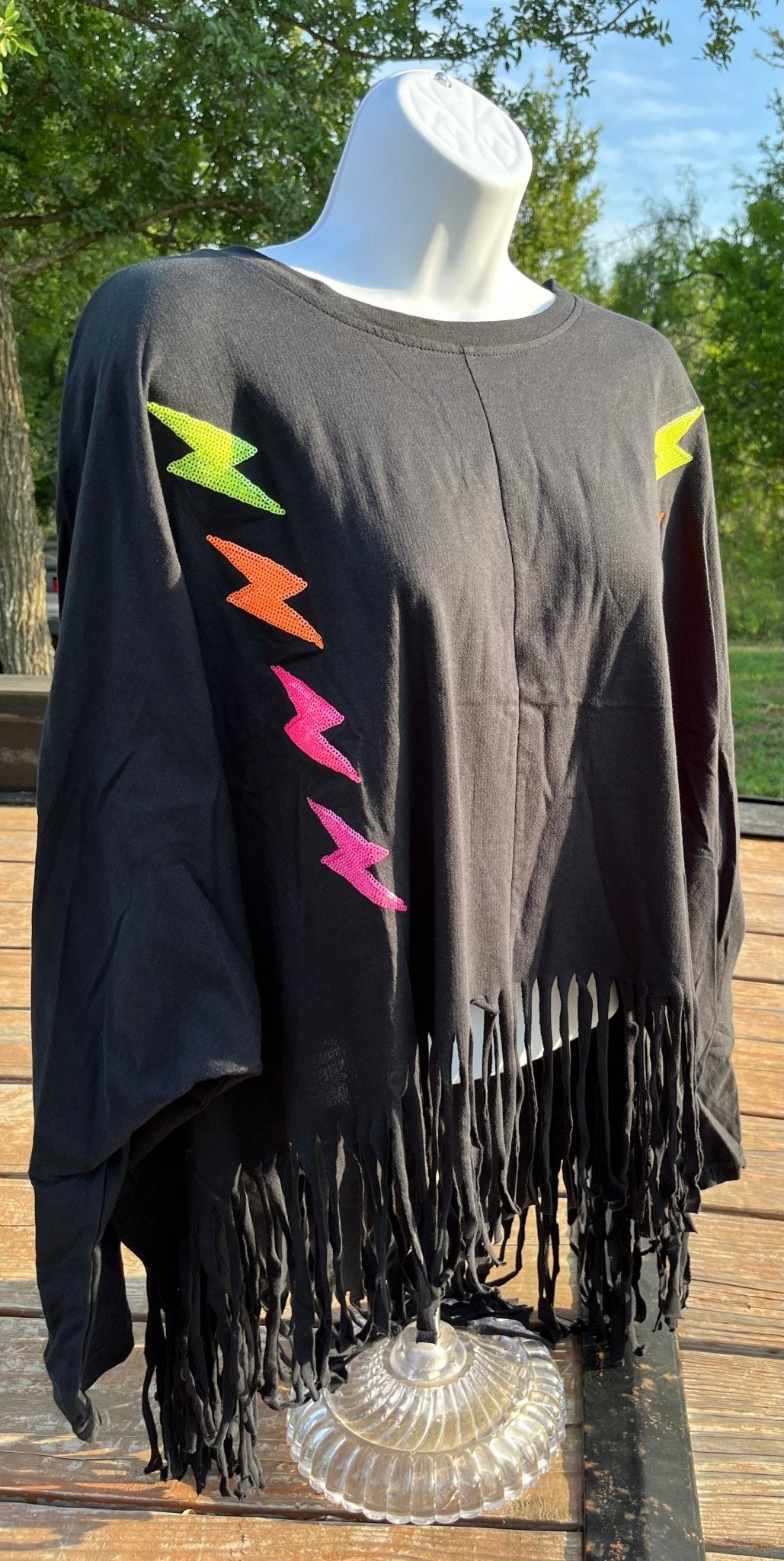 Vanilla Monkey brand. Long sleeved, cropped front, fringed top with yellow, orange and pink sequined lightning detail.