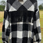 This fringe shacket is button down, buffalo plaid, with pockets & fringe detail. In red/black or white/black buffalo plaid.