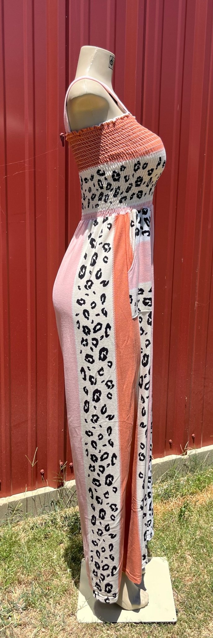 Vanilla Monkey. Tie shoulders with smocked bodice. Salmon and leopard color block. S, M $40