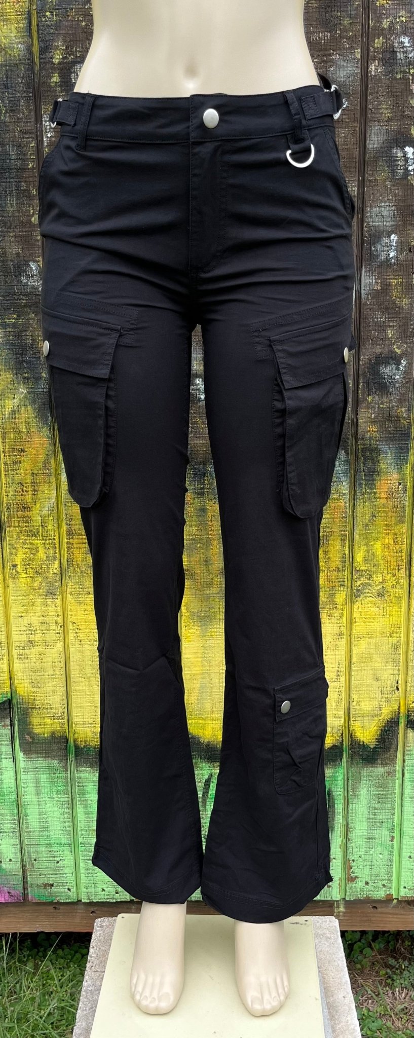 ADORA LA brand. These black cargo pants feature a low rise, straight fit with an adjustable D-ring waist detail. S, M, L $48