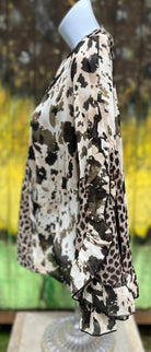 AMOLI brand. Sheer chiffon fabric with leopard and splotched color block design with sliced ruffled sleeves. S, M, L. $38