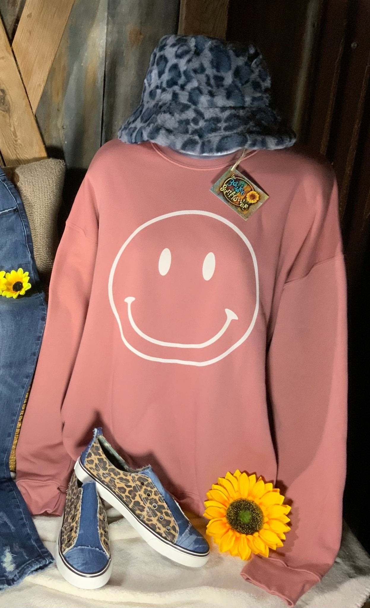 Oat Collective brand. Mauve Bella Canvas Sweatshirt Black or with White outlined happy face.