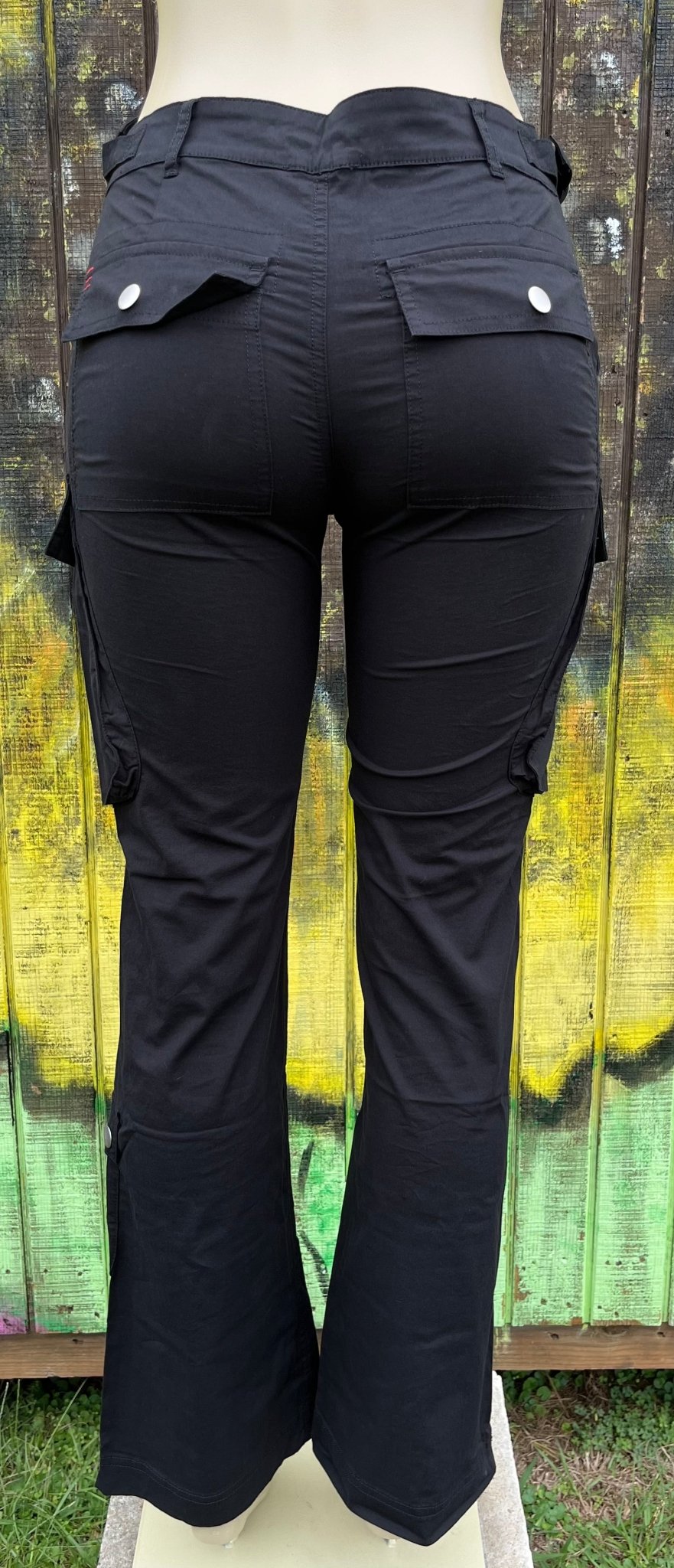 ADORA LA brand. These black cargo pants feature a low rise, straight fit with an adjustable D-ring waist detail. S, M, L $48