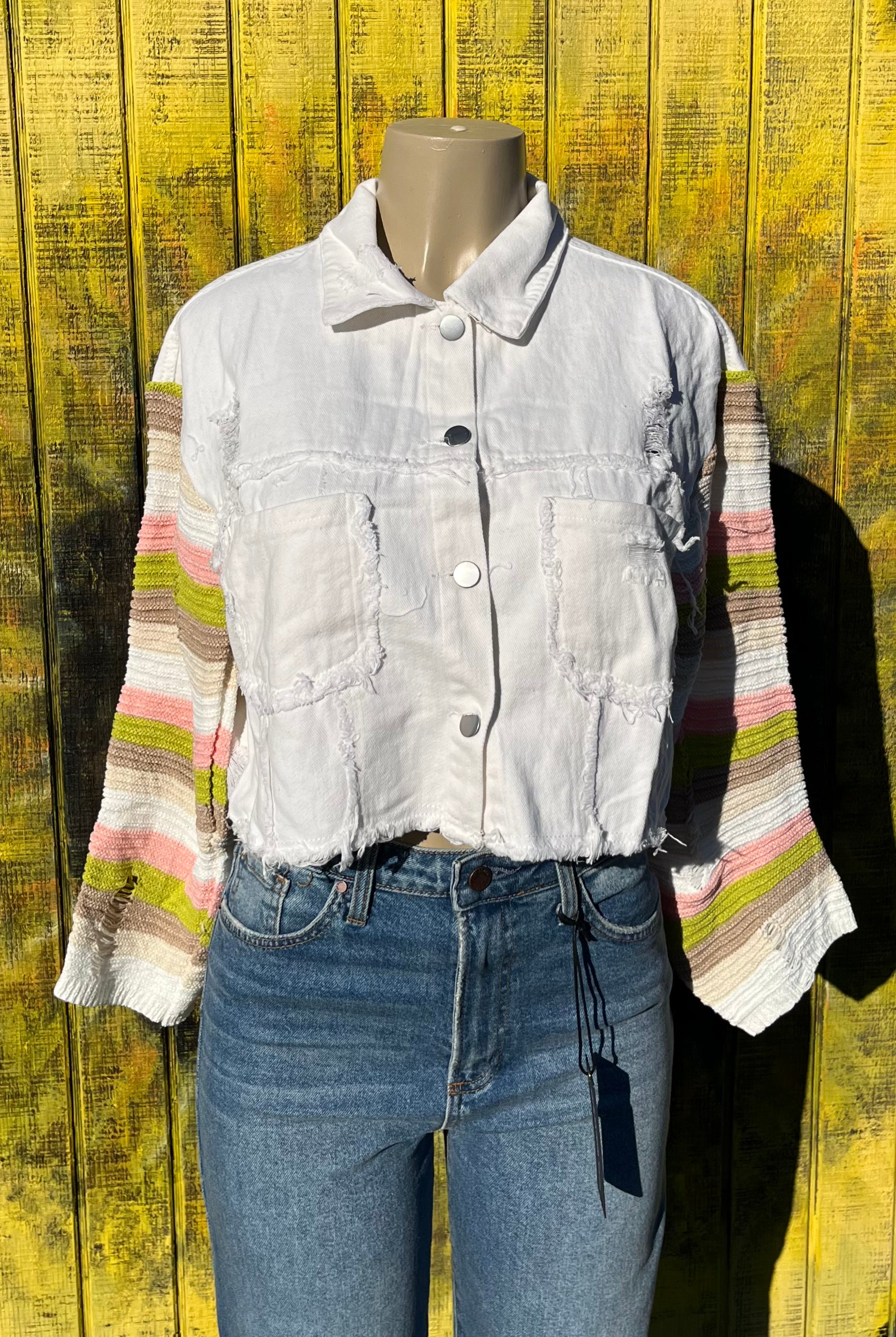 Bellissima Fashion brand. This distressed and frayed denim patchwork knit jacket boasts torn sleeves and metal buttons. 90% cotton. 10% polyester. S, M, L, XL. $47