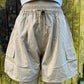 ADORA LA brand. Wide leg cargo shorts in khaki, black and gray. Lightweight with elastic drawstring waist and wide legs.