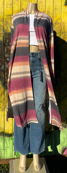 Stylish Wholesale brand. Long, lightweight, serape striped, open front cardigan with long sleeves, side slits and pockets. Cream, gray, plum and orange.  S, M, L $27