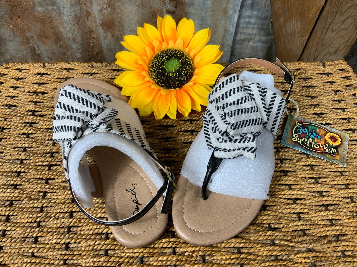 Stella Shoes brand. Black and white flats, tribal bow design, sling back sandal.