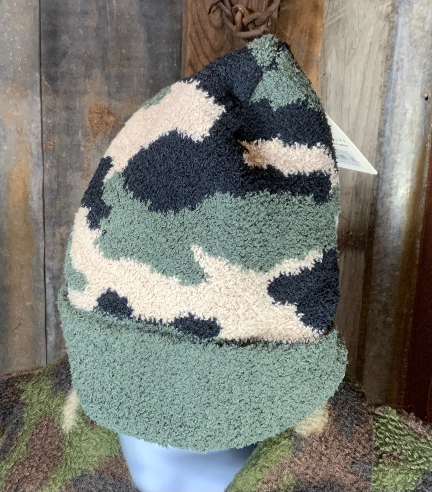 La Plaza Mall brand. This soft camo beanie is 100% polyester. One size. $9