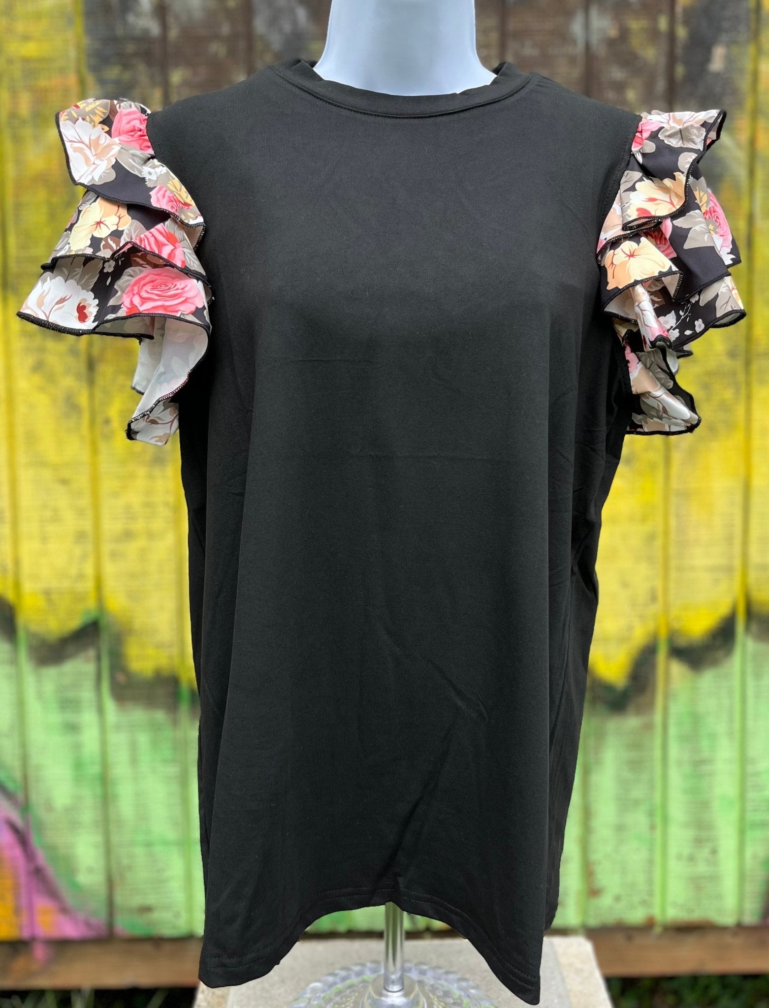 TREND SHOP brand. Black soft bodice with ruffled tiered floral short sleeves and classic crew neck tee. S, M, L $38