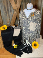 Vanilla Monkey brand. This Cheetah print top has an oversized fit with beige cuffs and front pocket. S, M, L $15