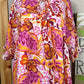 ADORA LA brand. Plus size peasant floral top with front tie detail, ruffled puff sleeve in hot pink, orange and white.