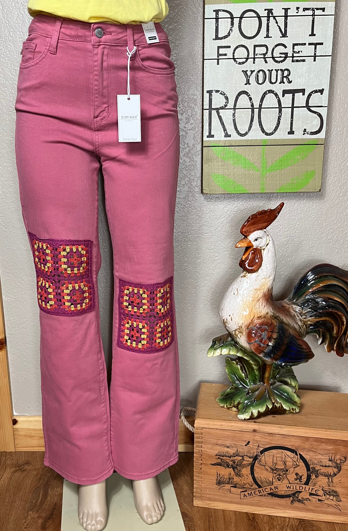 Judy Blue brand. Boho style dusty pink  jean with multicolored crocheted knee patches and wide leg. 93% cotton. 6% polyester. 1% spandex. Sizes: 3(26), 5(27), 7(28), 9(29), 11(30), 13(31) $79.50