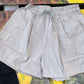 ADORA LA brand. Wide leg cargo shorts in khaki, black and gray. Lightweight with elastic drawstring waist and wide legs.