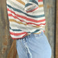 ESLEY brand. High-waisted, light wash denim. Available in blush or blue. Top clasp w/ elastic waist, pockets & shredded hem.