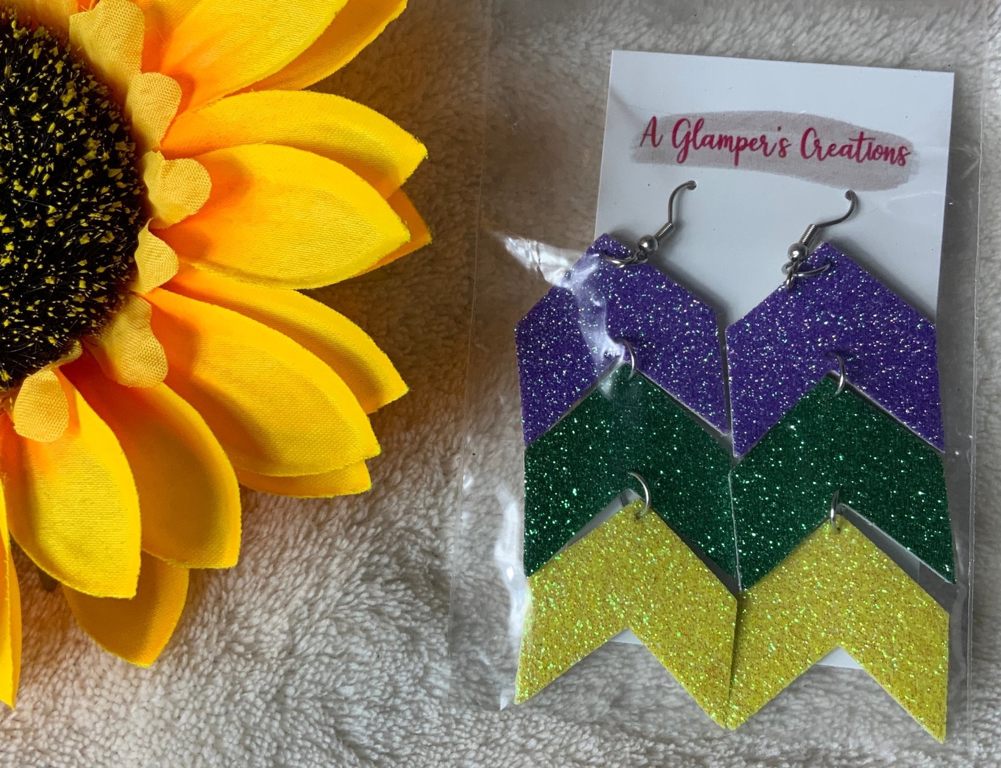 A Glamper's Creation, LLC brand. Purple, green, and yellow chevron silver dangles. $12