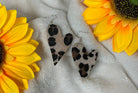 Unishe brand. Fuzzy textured silver dangle leopard heart earrings. $6