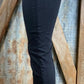 KanCan brand. These black skinny jeans are high rise with button fly. So stretchy that downsizing is suggested.