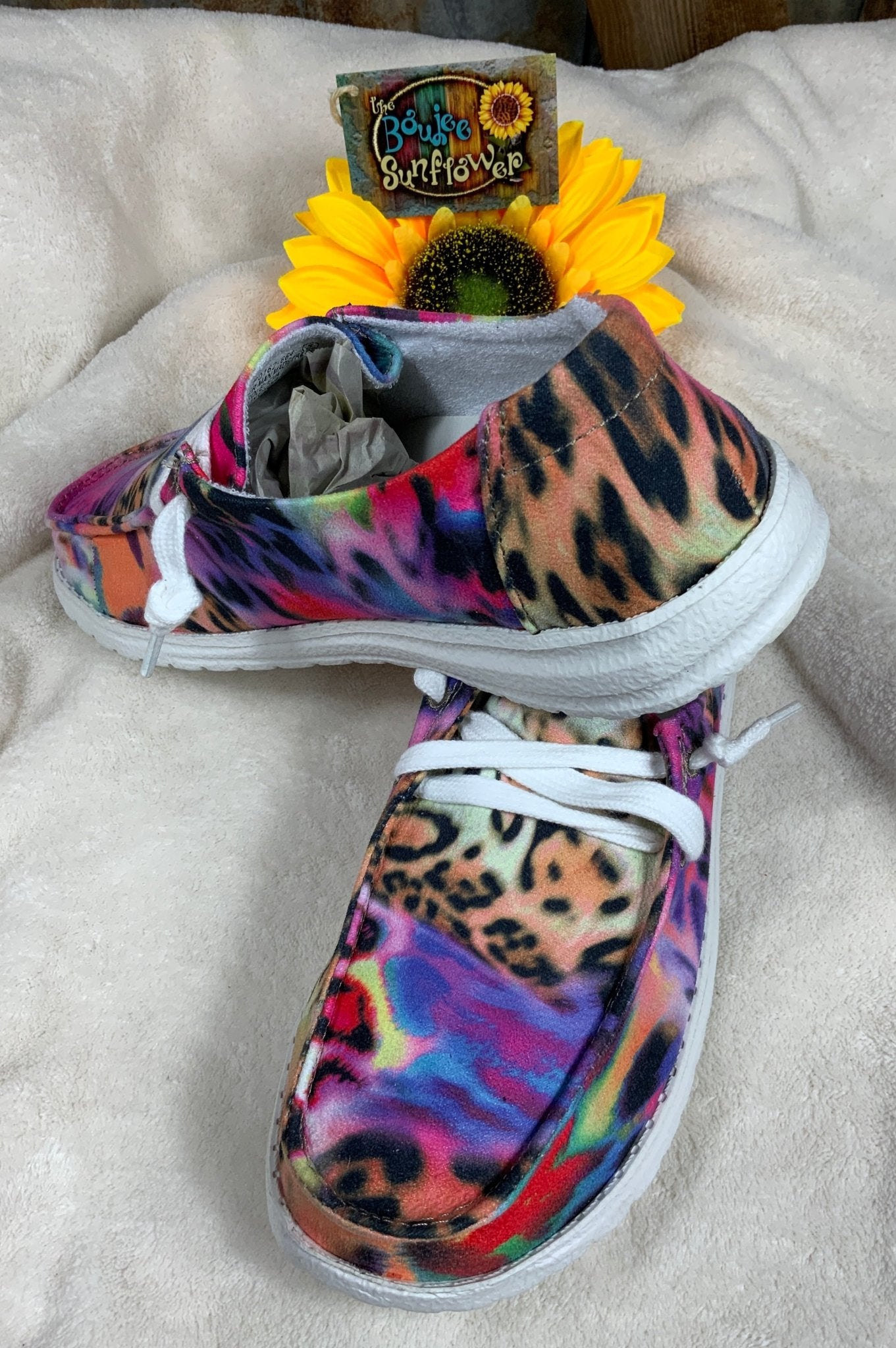 Multi-bright colored design with vibrant tiger and leopard print slip-ons. White lace detail. White lightweight soles.