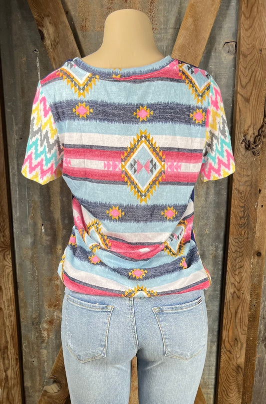 Celeste Clothing brand. Aztec and striped design print with navy accents, short sleeves with multicolored chevron pattern.