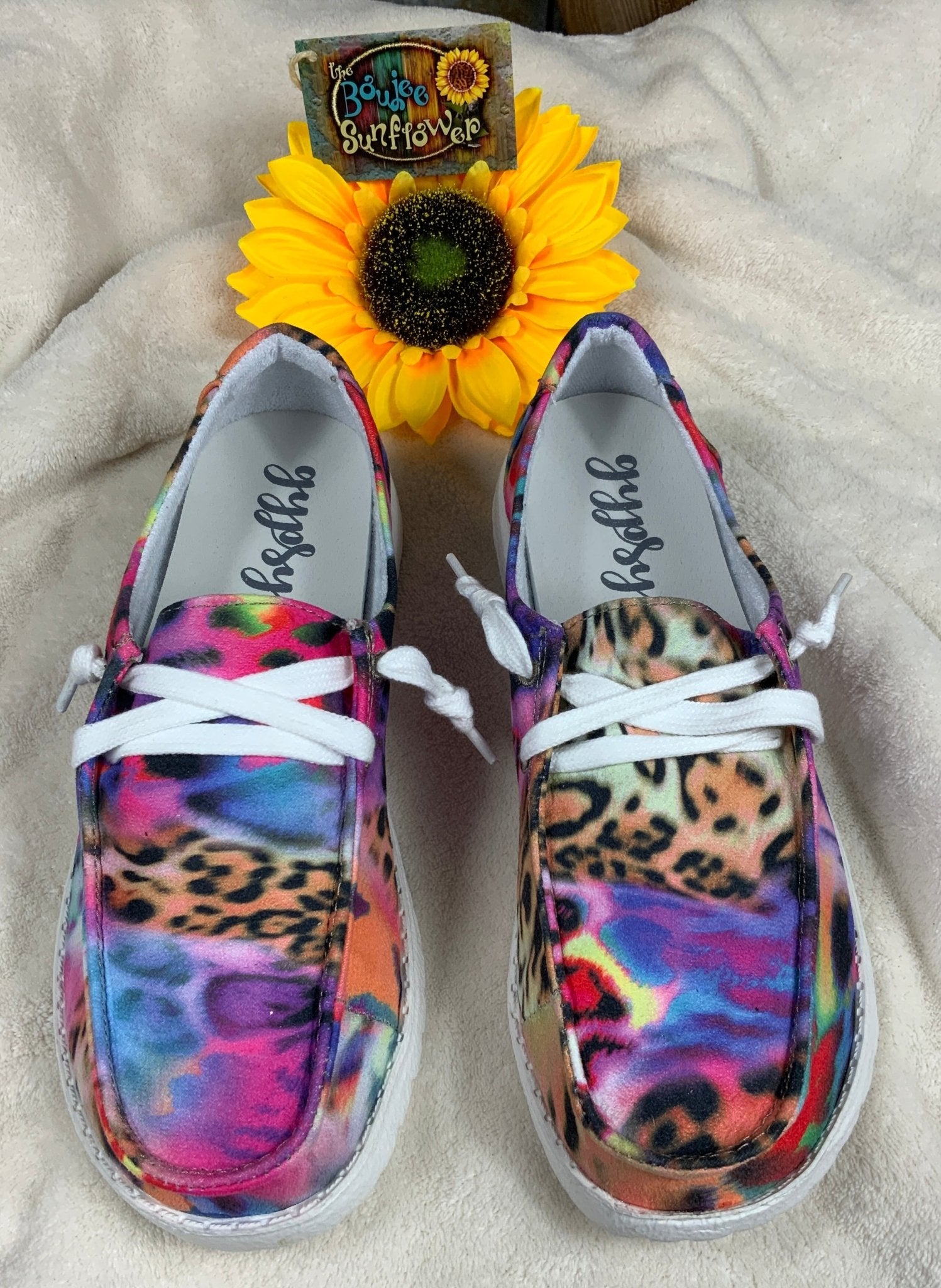 Multi-bright colored design with vibrant tiger and leopard print slip-ons. White lace detail. White lightweight soles.