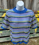 Miss Sparkling brand. Royal blue top with multicolored stripes and unique knit design that allows for subtle transparency. S, M, L, XL $27