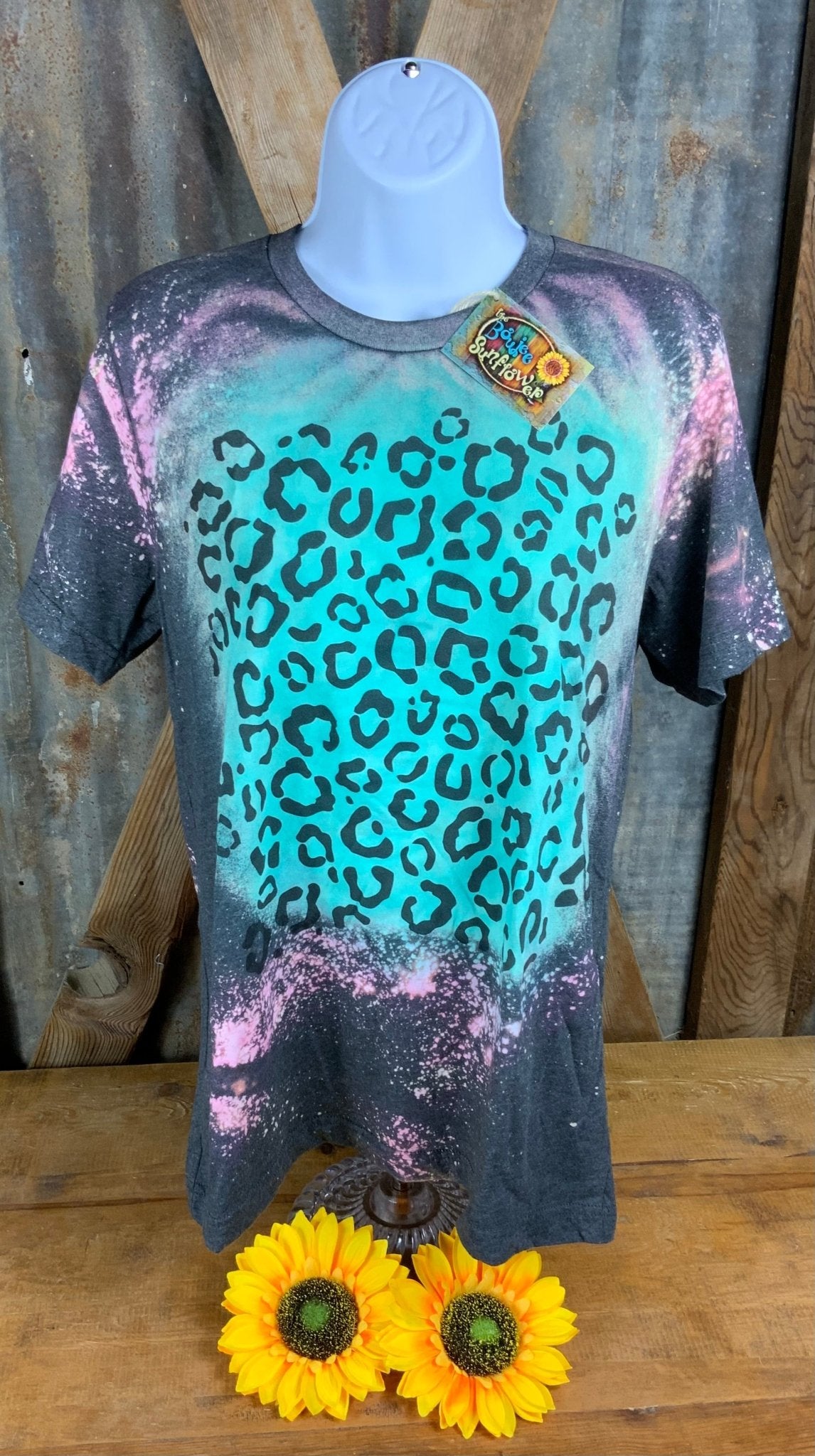 REMOVED BRAND brand. Gray bleached accented with pink tint Bella Canvas with turquoise sublimation and black leopard tee.