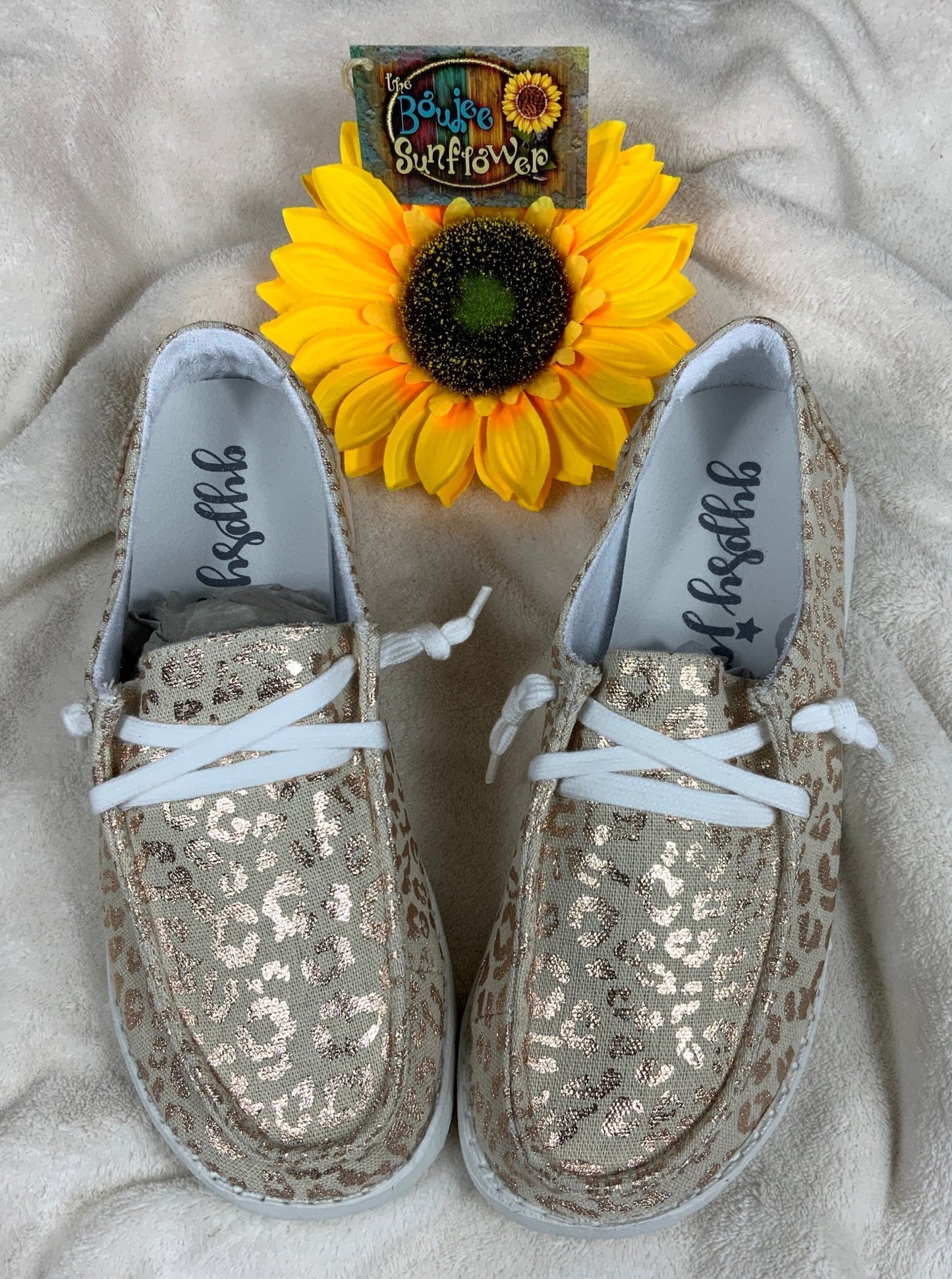 Gypsy Jazz brand. Kylie is a slip-on tan canvas shoe with gold metallic leopard print, lace detail & lightweight rubber sole.