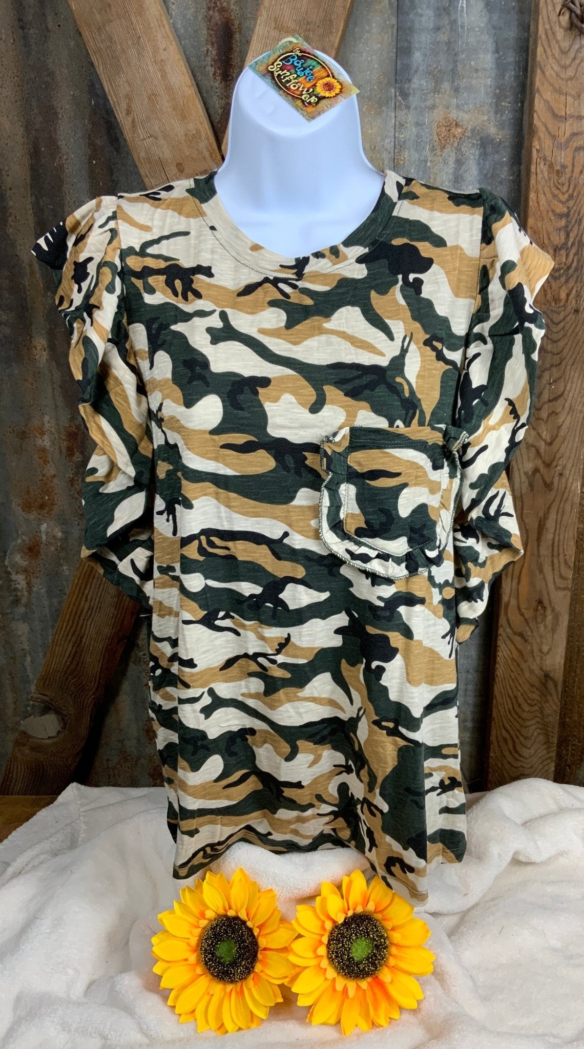 ESLEY brand. Lightweight knitted fabric, sleeveless with ruffled shoulder detail. Green, beige and tan camo print. M, L $20