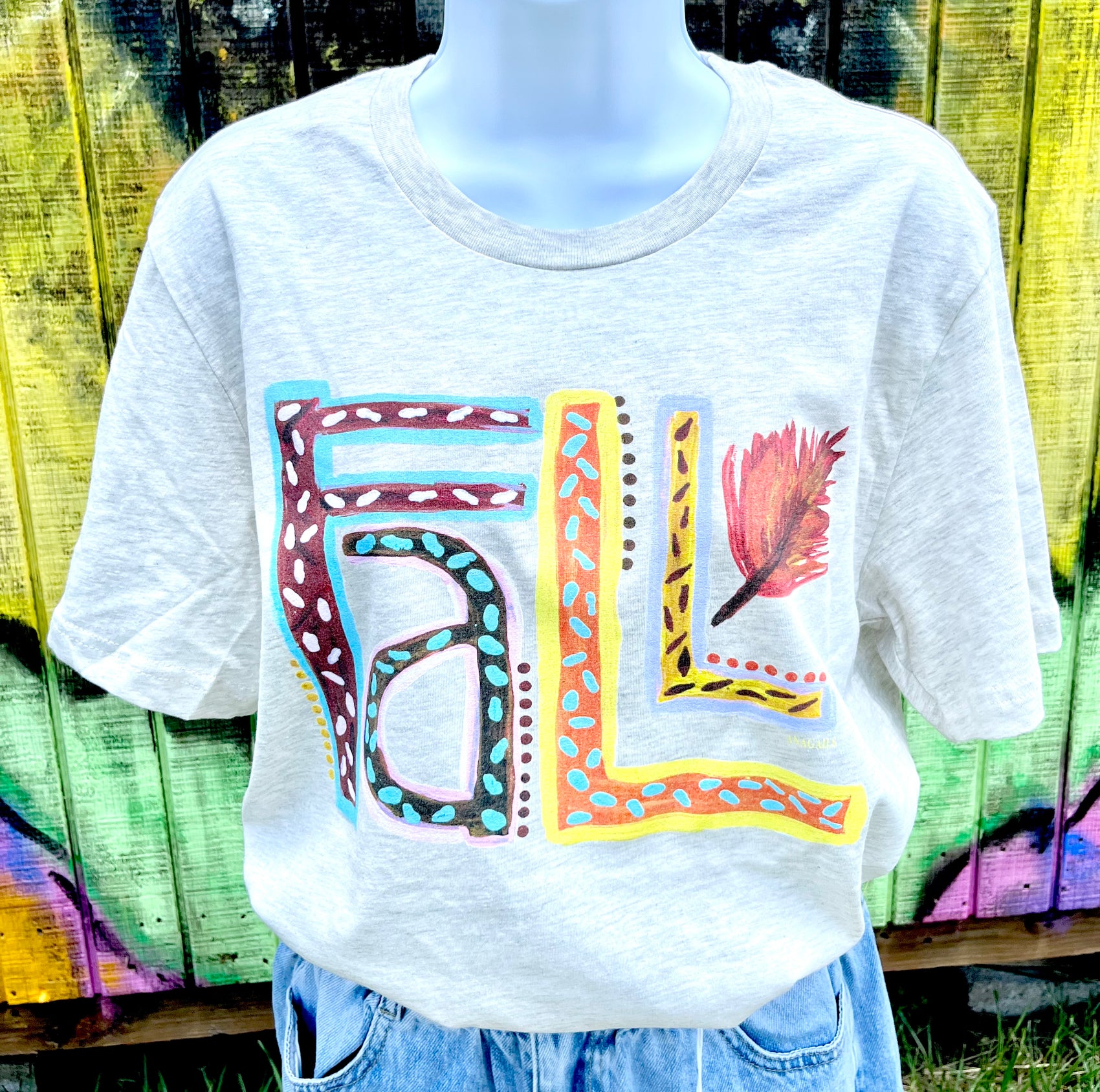 Anagails brand. Heathered natural Fall tee with hand painted colorful letters and designs. S, M, L, XL, 2X. $25