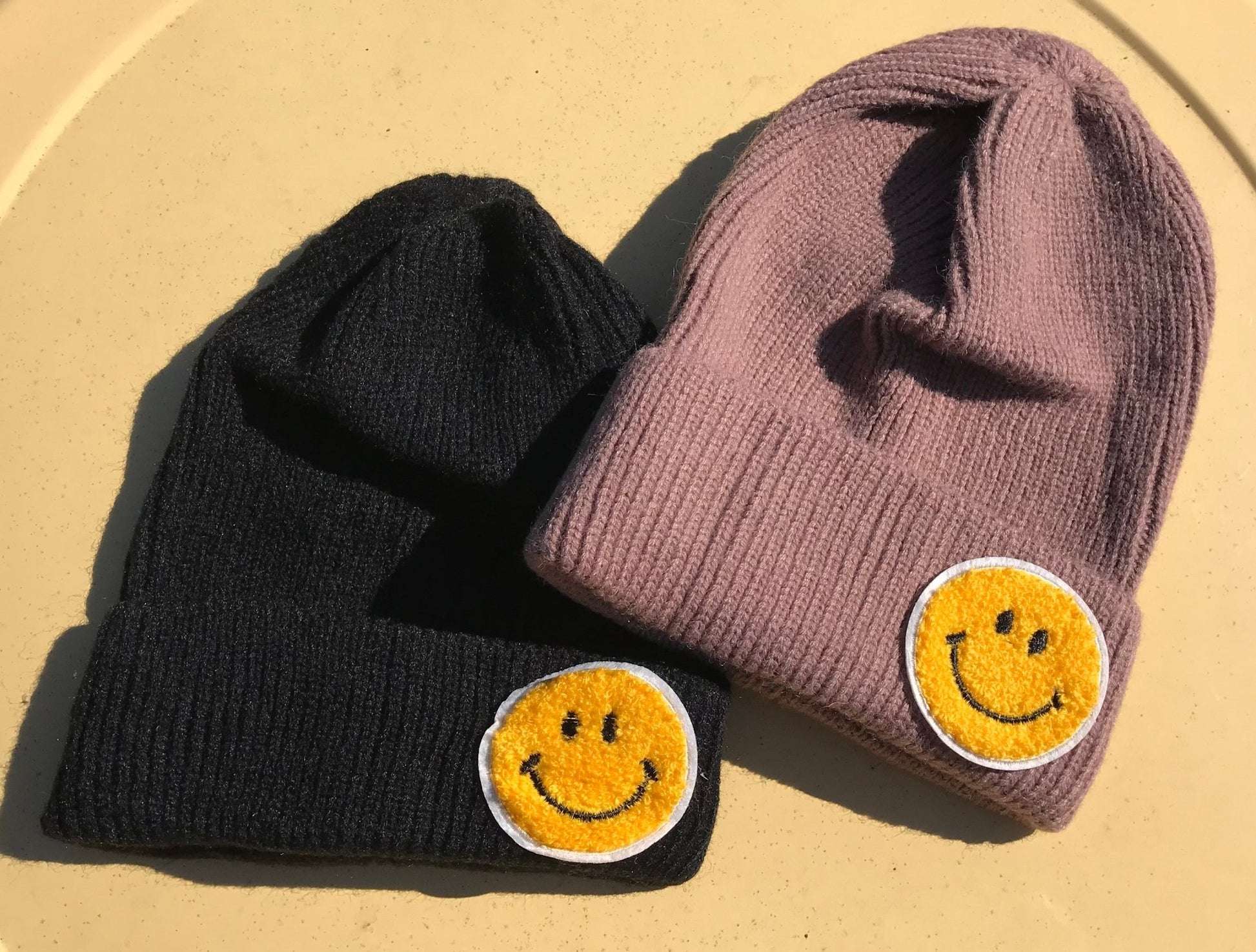 Babe Wholesale Co brand. Happy face beanie in black or brown knit. Adult size. $9