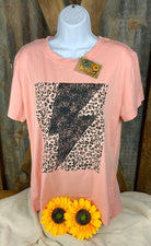 ESLEY brand. Tee available in light blue, white or peach with black lightning bolt and leopard design. S, M, L, XL. $10