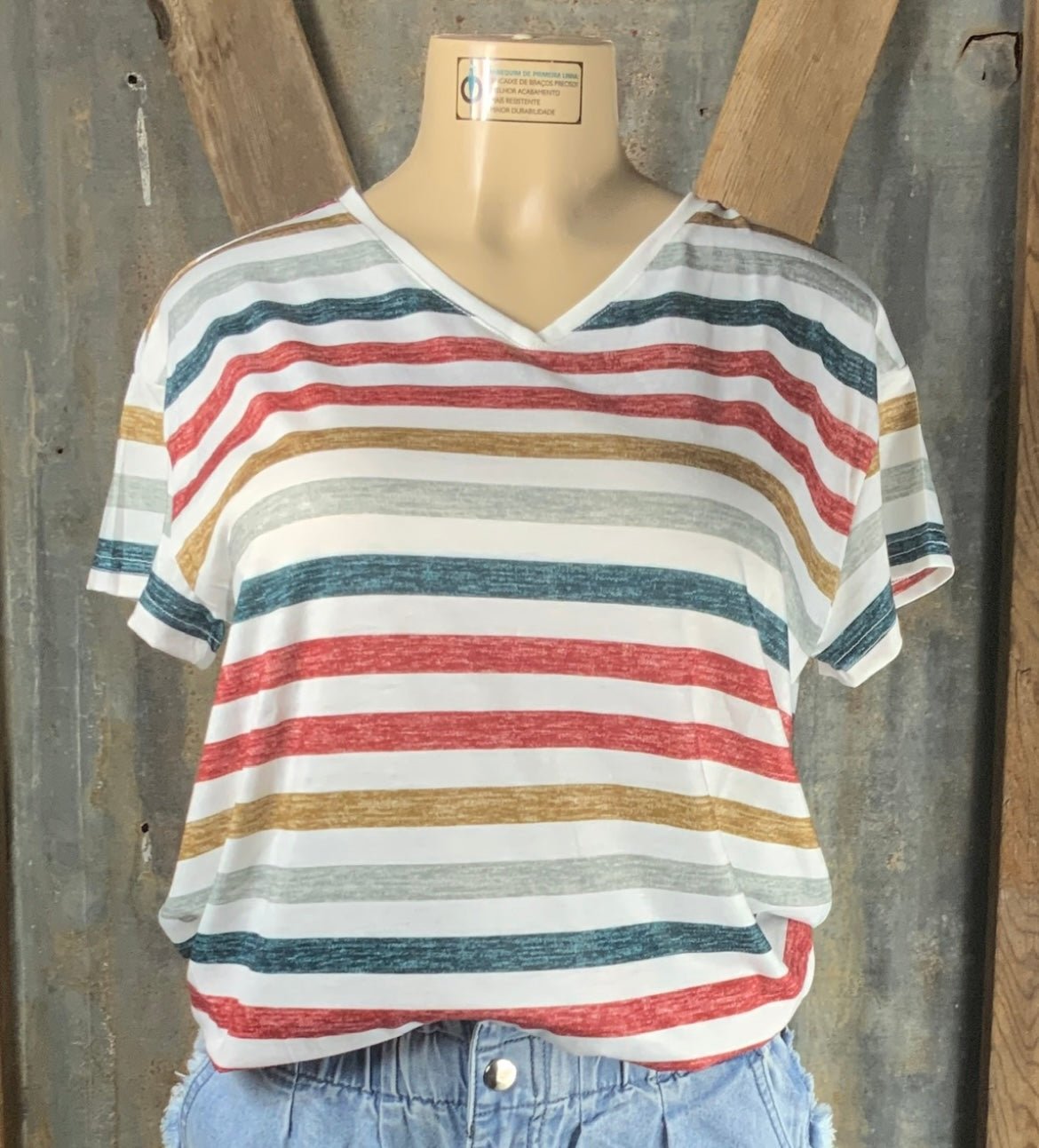 ESLEY brand. White multicolored stripe V-neck design and rounded hem. M, L, XL. $15