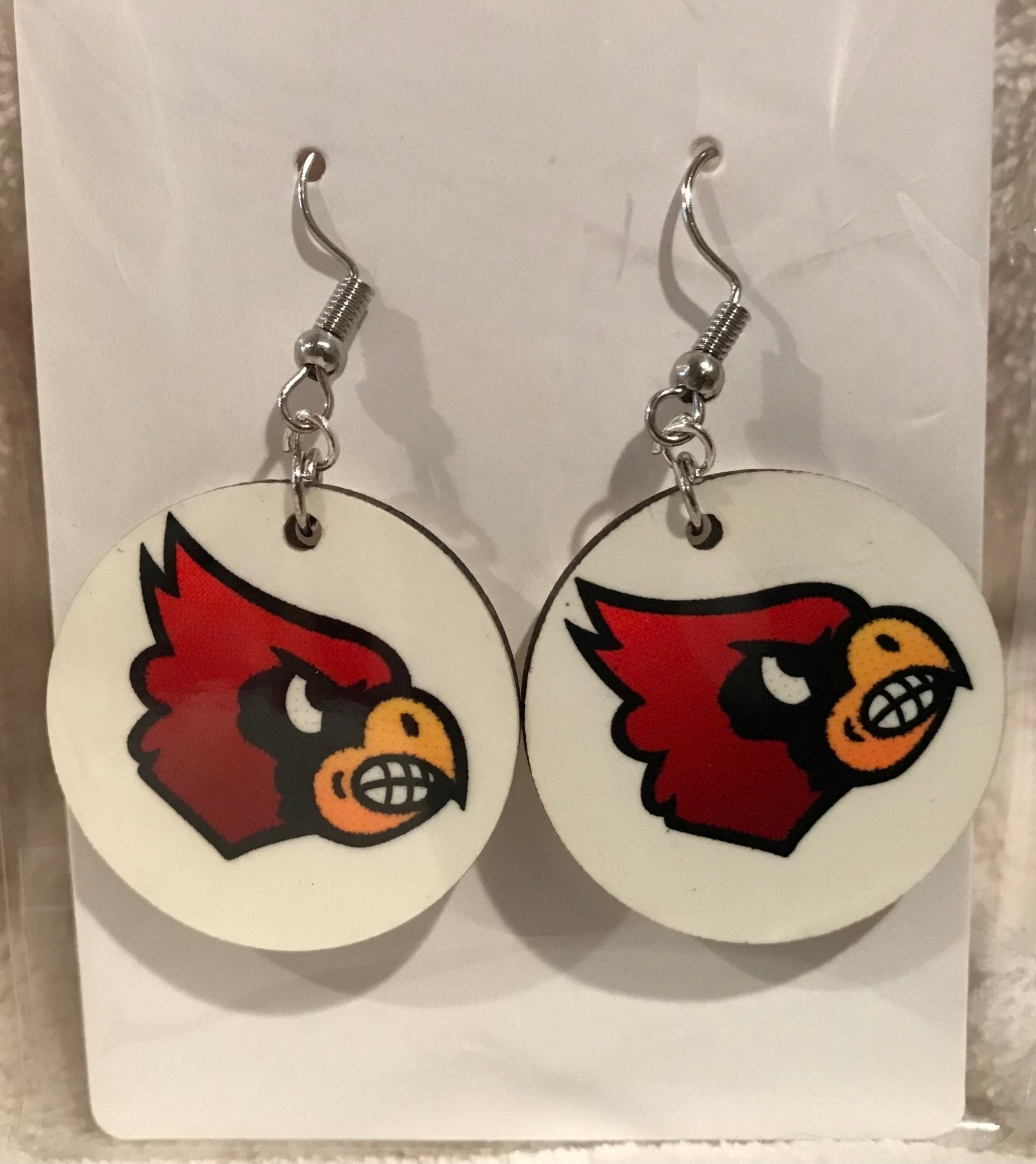 Earring Babe Boutique. These Cardinal dangle earrings are made from hard material. $7.25.