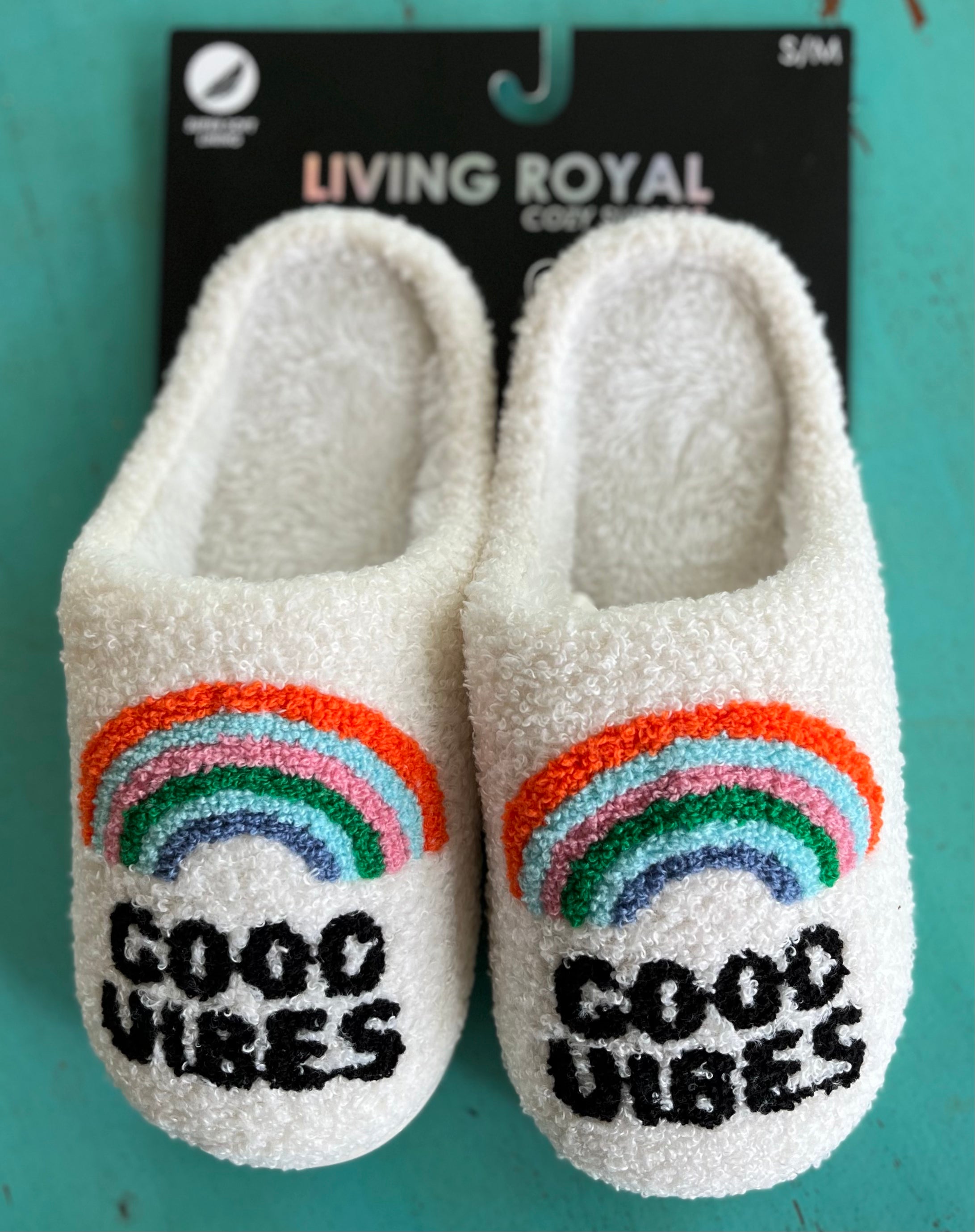 Living Royal brand.  Soft fabric interior and exterior with white rubber sole slipper. Wear inside and out. Sizes: S/M, M/L. $22