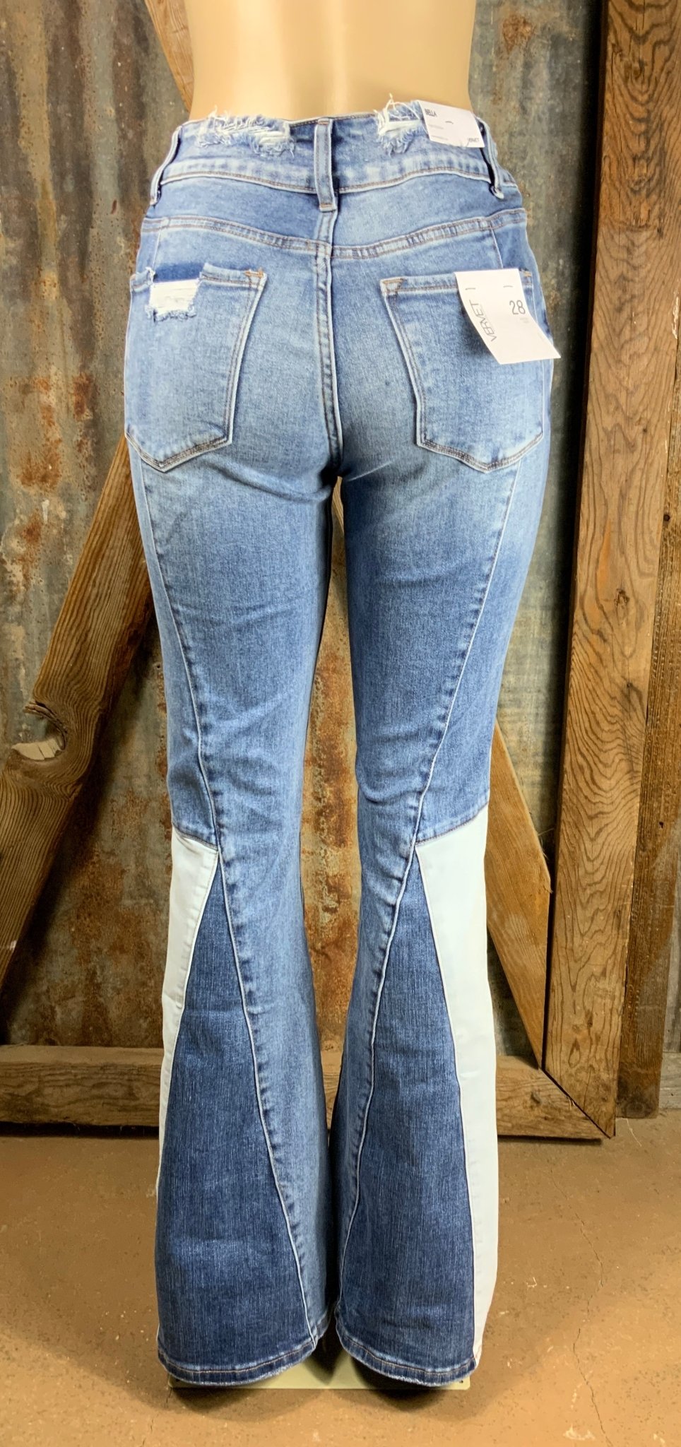 VERVET by Flying Monkey brand. High rise and super flare vintage look jeans in medium wash with a light wash panel.