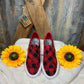 Gypsy Jazz brand. Buffalo plaid with criss-crossed strap Velco closures and white soles.