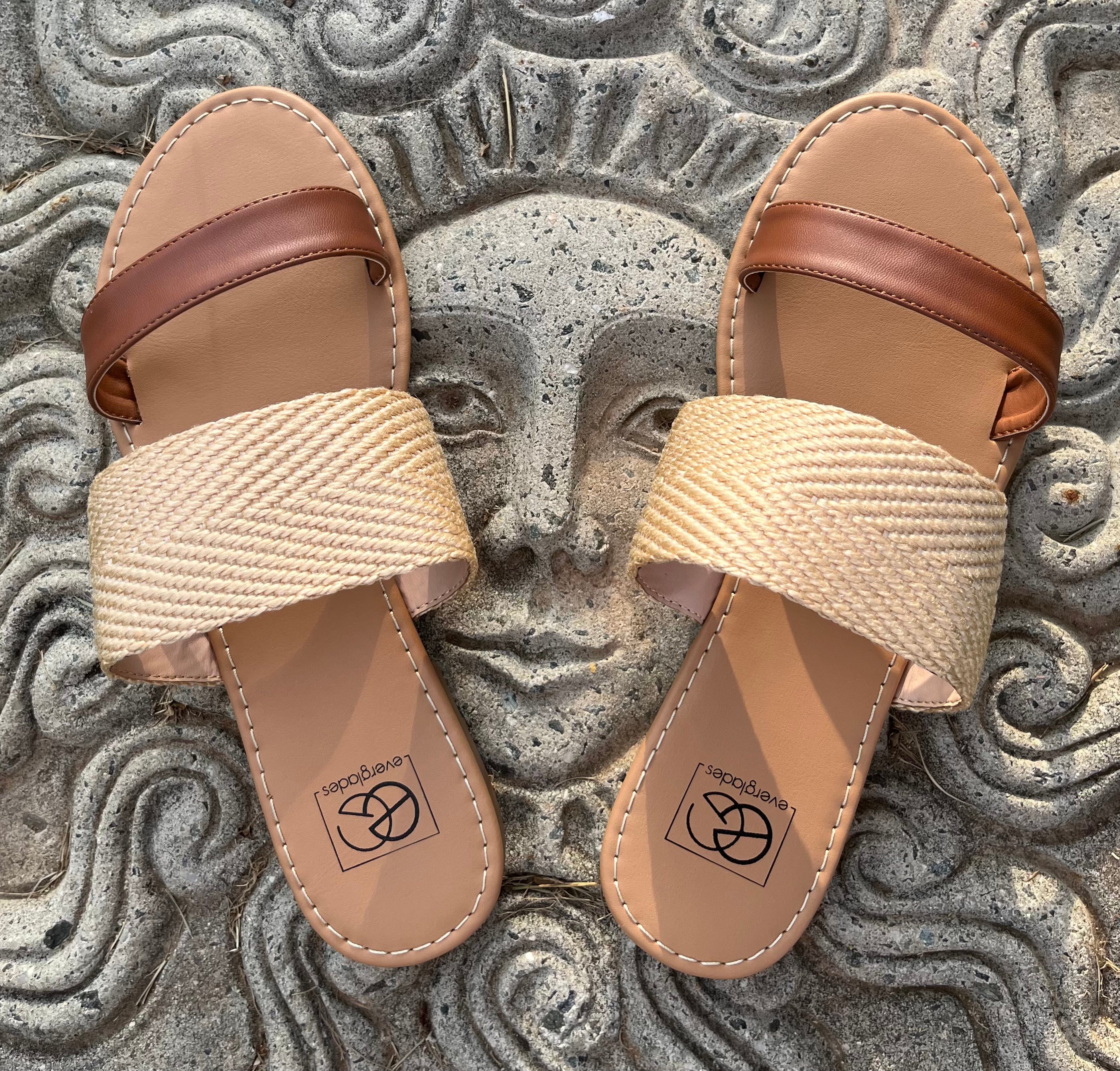 Miami Shoe brand. Tan combo flat sandal with thin faux leather brown toe strap and wider tan twine band with lightly padded sole. Sizes: 6, 7, 8, 9, 10. $25