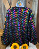 And The Why brand. Black long sleeved holographic zebra striped sweater. S/M or M/L. $35