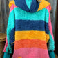 Katydid brand. Lightweight rainbow hoodie wrap with pockets in aqua, navy, pink, gold and orange. One size. $30